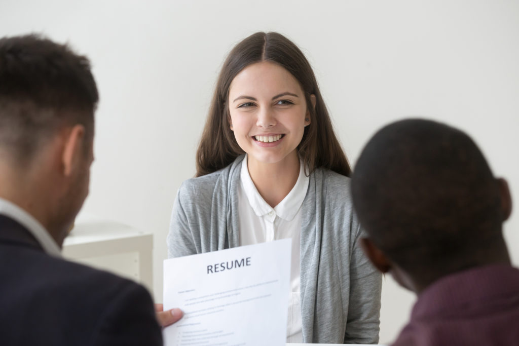 Girl interviewing with her resume, Platinum Resumes, Kansas City, MO