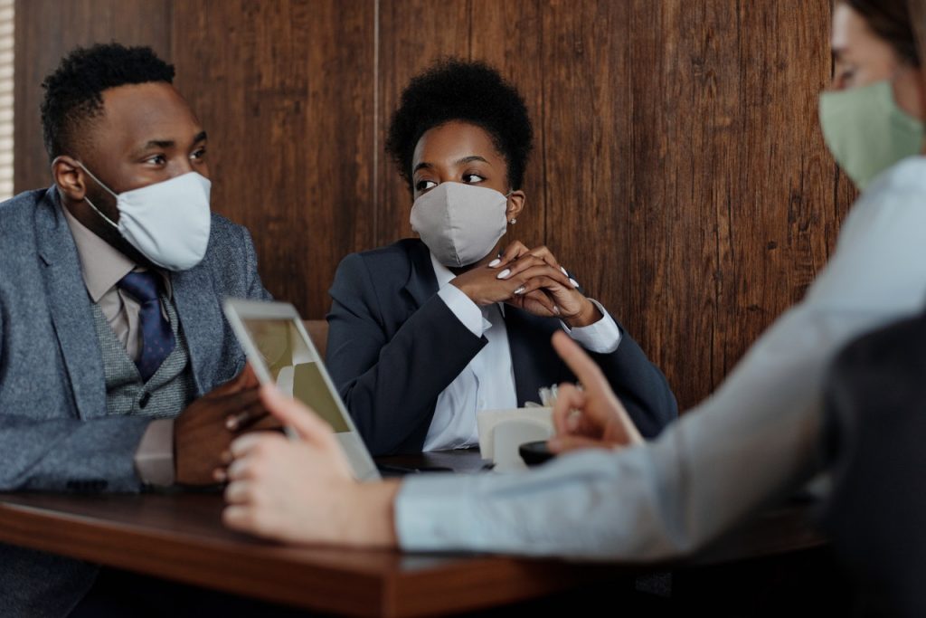 3 people in masks at a laptop, Platinum Resumes, Kansas City, MO