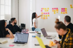 team of empolyees with sticky notes on wall, Platinum Resumes, Kansas City, MO