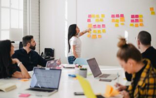 team of empolyees with sticky notes on wall, Platinum Resumes, Kansas City, MO