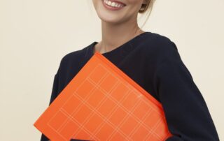 Blonde woman with orange binder, Man taking notes talking to man with name tag, Platinum Resumes, Kansas City, MO